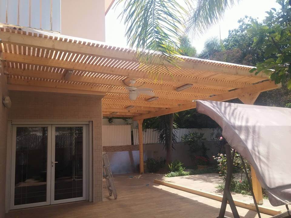 Outdoor living space with custom pergola